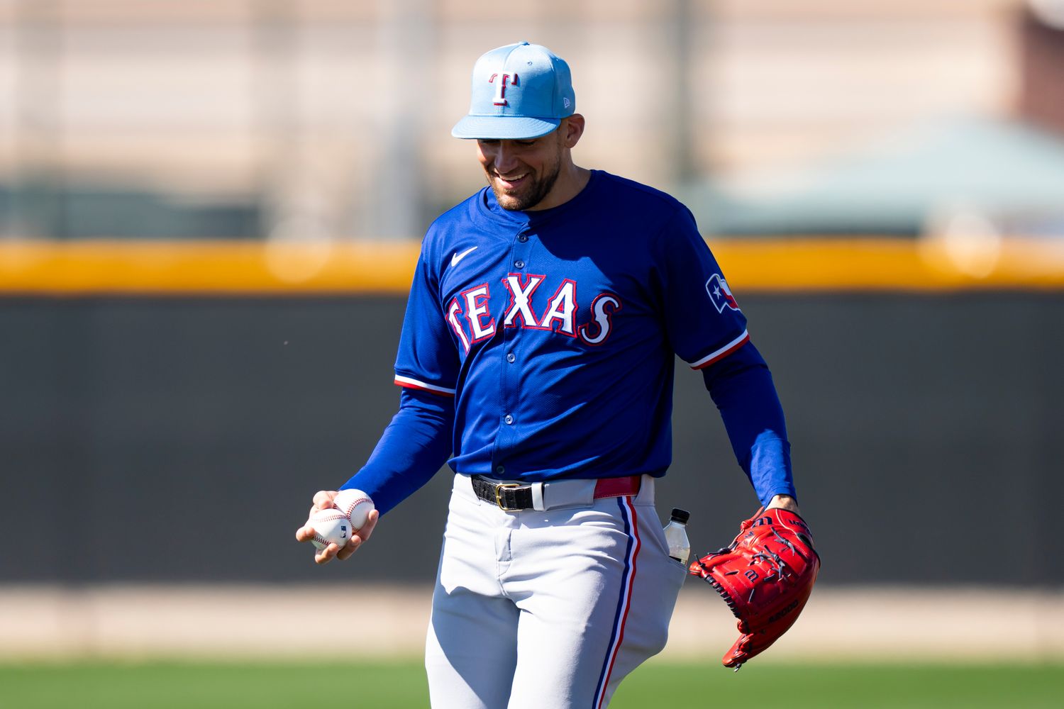 Nathan Eovaldi threw two scoreless innings in his first spring training appearance on Saturday in the Texas Rangers' 5-4 loss to the Kansas City Royals.